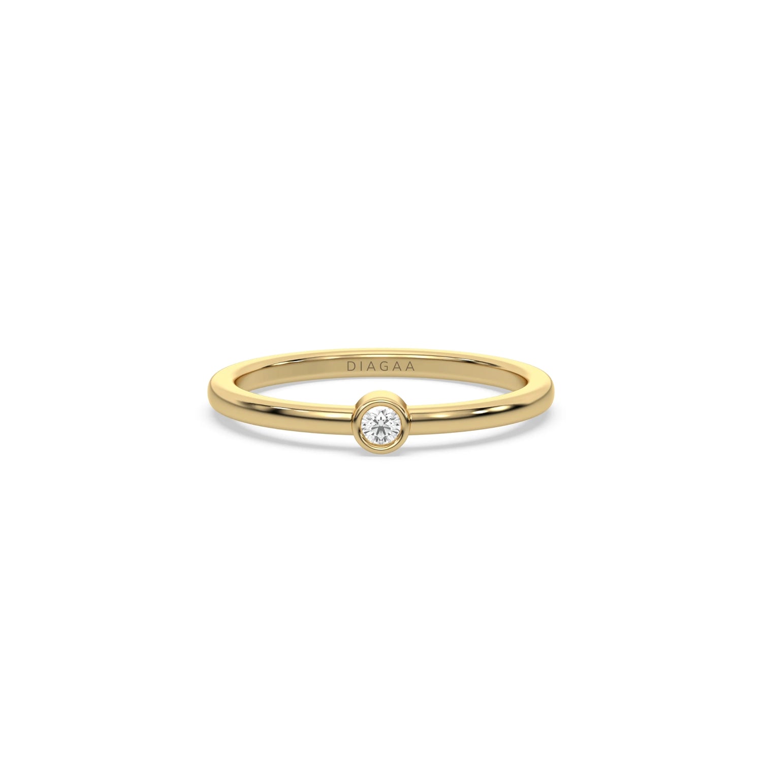 This yellow gold ring displayed on front view is made with brilliant round diamond set in bezel setting