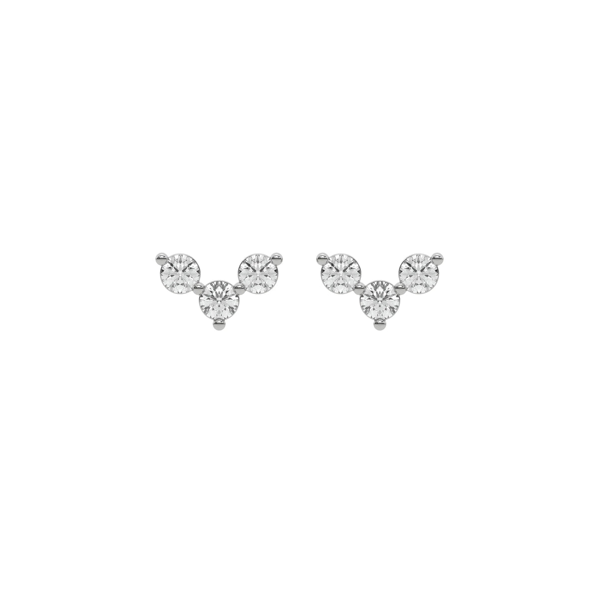18k white gold round cut diamond trio stud earrings set in prong setting.