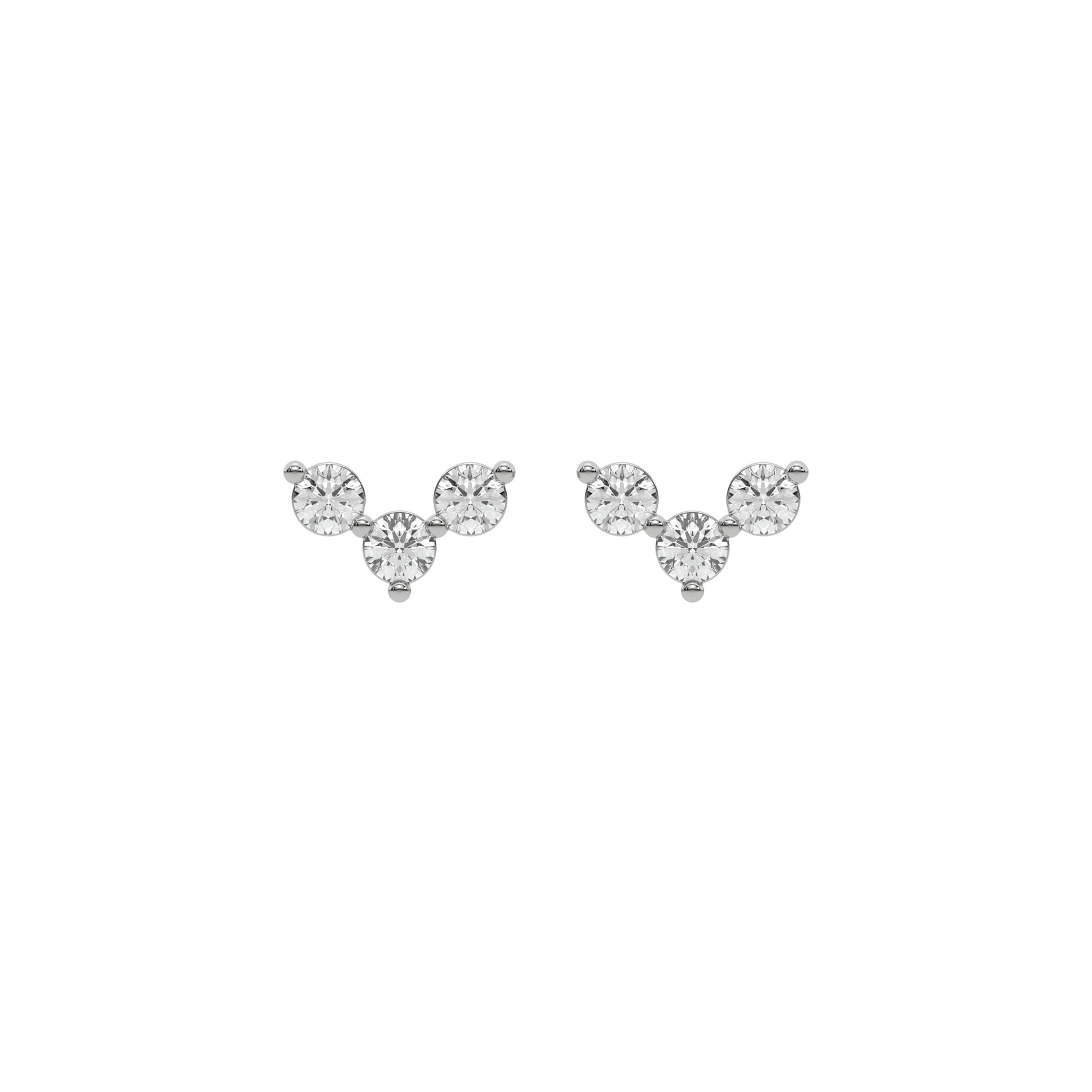 18k white gold round cut diamond trio stud earrings set in prong setting.