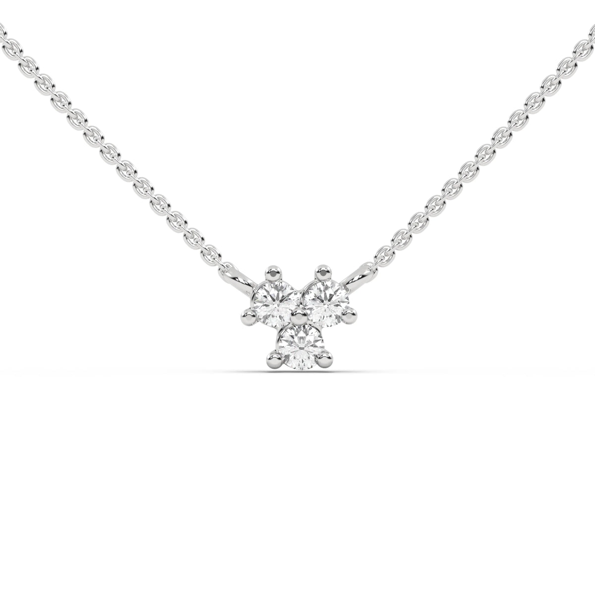 This white gold necklace is made with three round diamonds arranged in a triangular shape and securely set in prongs in top view