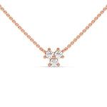 This rose gold necklace is made with three round diamonds arranged in a triangular shape and securely set in prongs in top view