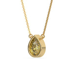 This yellow gold Fancy Yellow Pear Solitaire Diamond Necklace made with a fancy yellow pear cut diamond in bezel setting with adjustable chain in side view