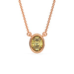 This rose gold Fancy Yellow Oval Solitaire Diamond Necklace made with an fancy yellow oval cut diamond in bezel setting with adjustable chain in top view