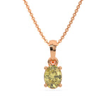 This rose gold Fancy Yellow Oval Solitaire Diamond Necklace made with an fancy yellow oval cut diamond in a four prong setting with adjustable chain in top view