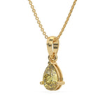 This yellow gold Fancy Yellow Pear Solitaire Diamond Necklace made with a fancy yellow pear cut diamond in a four prong setting with adjustable chain in side view