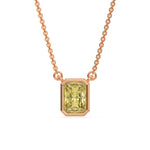 This rose gold Fancy Yellow Radiant Solitaire Diamond Necklace made with a fancy yellow radiant cut diamond in bezel setting with adjustable chain in top view