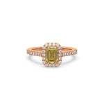 This rose gold ring displayed in front view is made with a Emerald solitaire diamond set in four-prong setting