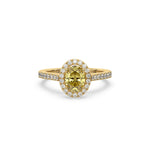 This yellow gold ring displayed in front view is made with a oval solitaire diamond set in four-prong setting