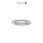 This white gold ring displayed on front view is made with baguette diamond in the center and flanked by three round brilliant-cut diamonds on each side