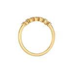 This yellow gold Zig Zag Round Diamond Ring handmade with round brilliant-cut diamonds, each set individually in a four prong setting and arranged in a zig zag pattern in through finger view