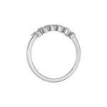 This white gold Zig Zag Round Diamond Ring handmade with round brilliant-cut diamonds, each set individually in a four prong setting and arranged in a zig zag pattern in through finger view