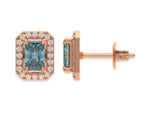 18k Rose gold Radiant Diamond Halo Earrings made with a fancy blue radiant cut solitaire diamond set in a four prong setting.