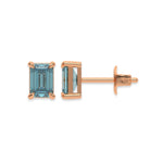 18k rose gold Emerald Diamond Earrings made with an fancy blue emerald-cut diamond set in a four prong setting