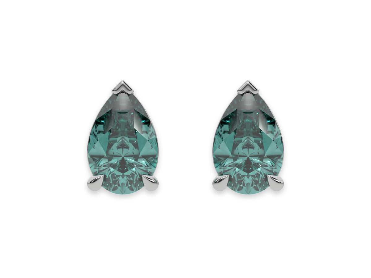 18k White gold Pear shaped diamond stud earrings made with a fancy green pear shaped diamond set in a four prong setting