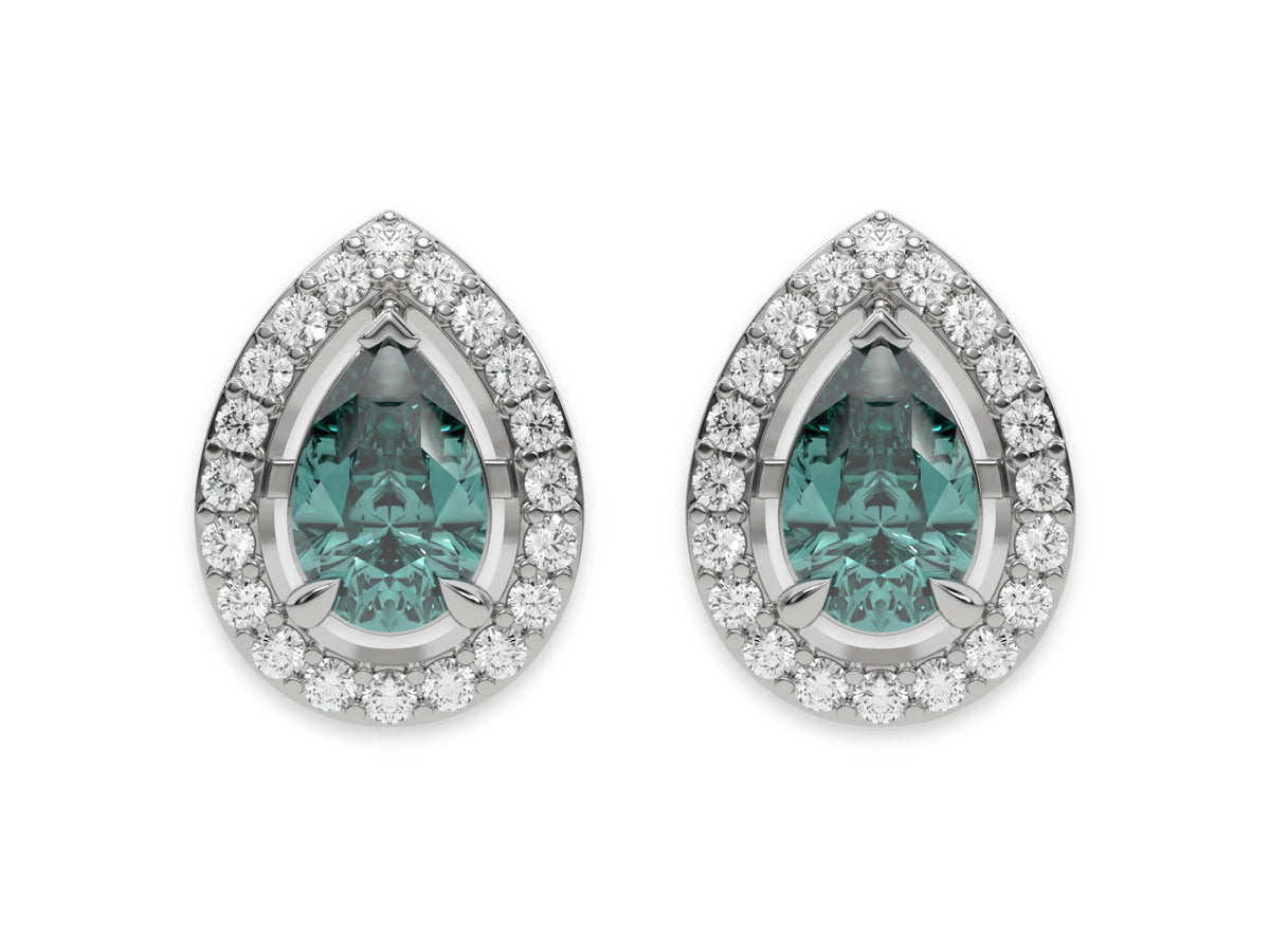 18k white gold Pear Diamond Halo Earrings made with a fancy green pear cut solitaire diamond set in a four prong setting.