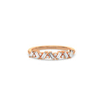 This rose gold ring displayed on front view is made with round brilliant-cut diamonds and baguette set in a prong setting