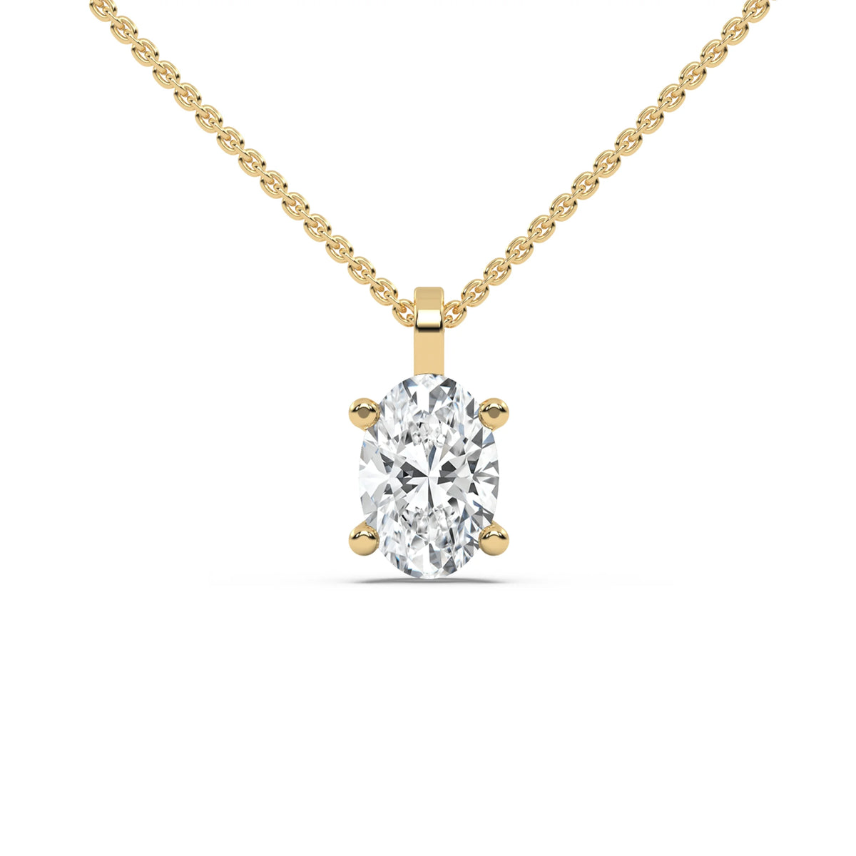 Elegant solitaire oval diamond necklace on a delicate yellow gold cable chain, featuring a clear, brilliant-cut prong-set pendant.