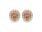 18k yellow gold Oval Diamond Halo Earrings made with an fancy pink oval cut solitaire diamonds set in a four prong setting