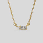 This yellow gold Cluster Diamond Necklace made with radiant and round diamonds, positioned right next to each other and securely set in prong setting