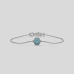 Fancy Blue Solitaire Oval Diamond Bracelet made with fancy Blue oval diamond, securely set in bezel setting