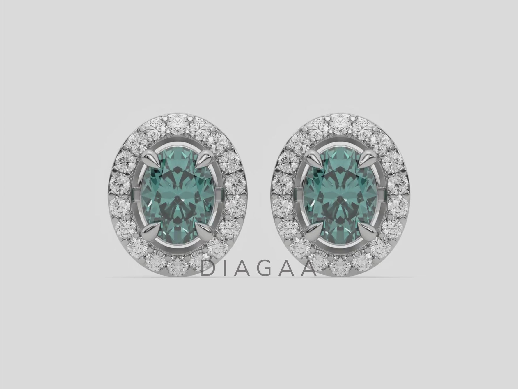 10k white gold Oval Diamond Halo Earrings made with an fancy green oval cut solitaire diamonds set in a four prong setting
