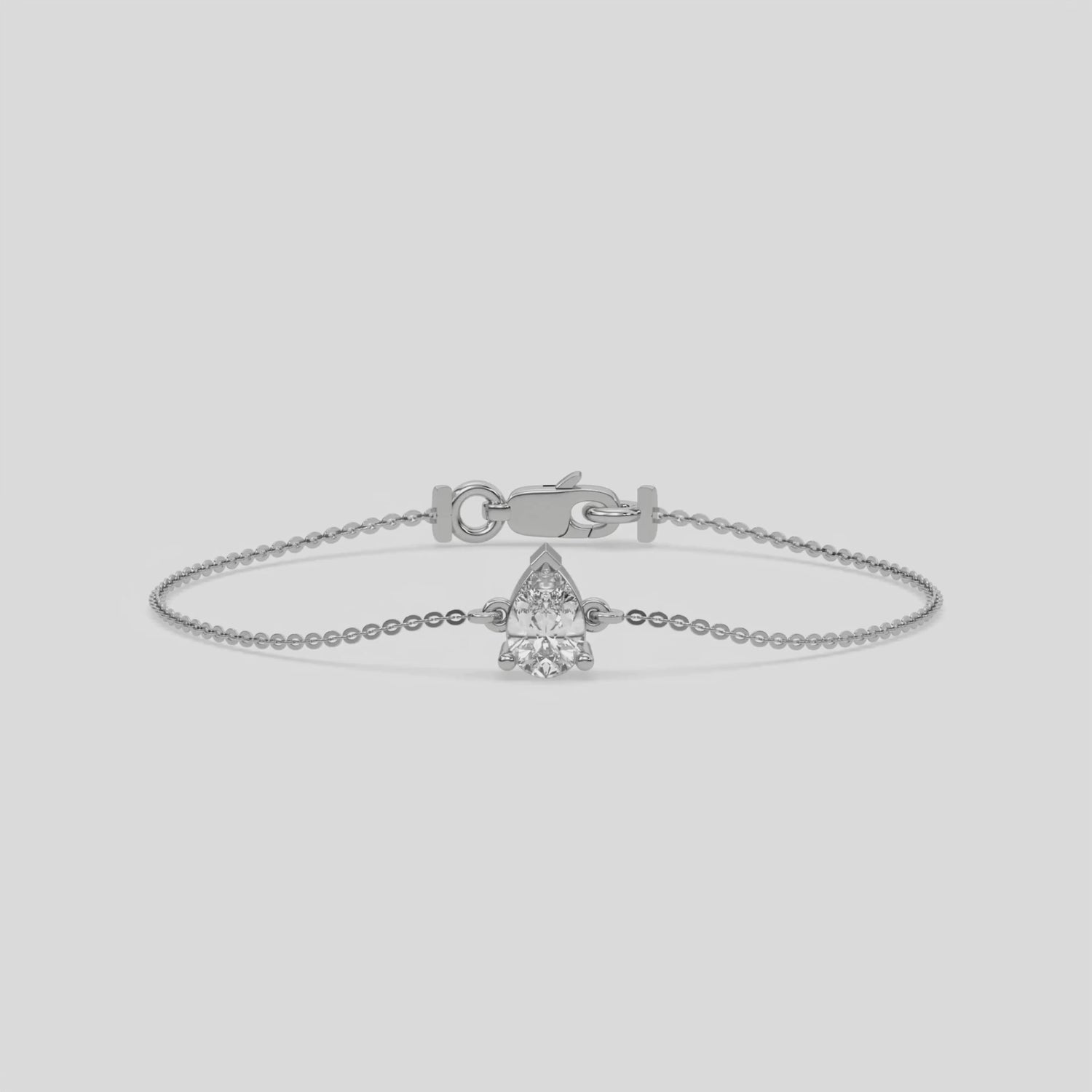 This video features a Solitaire Pear Diamond Bracelet made with pear diamond, securely set in prong setting