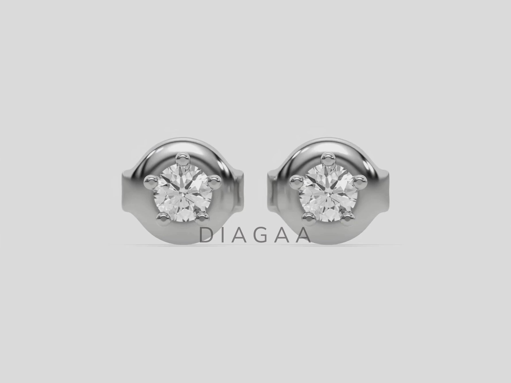 18k White gold round cut diamond stud earrings set in a five prong setting.