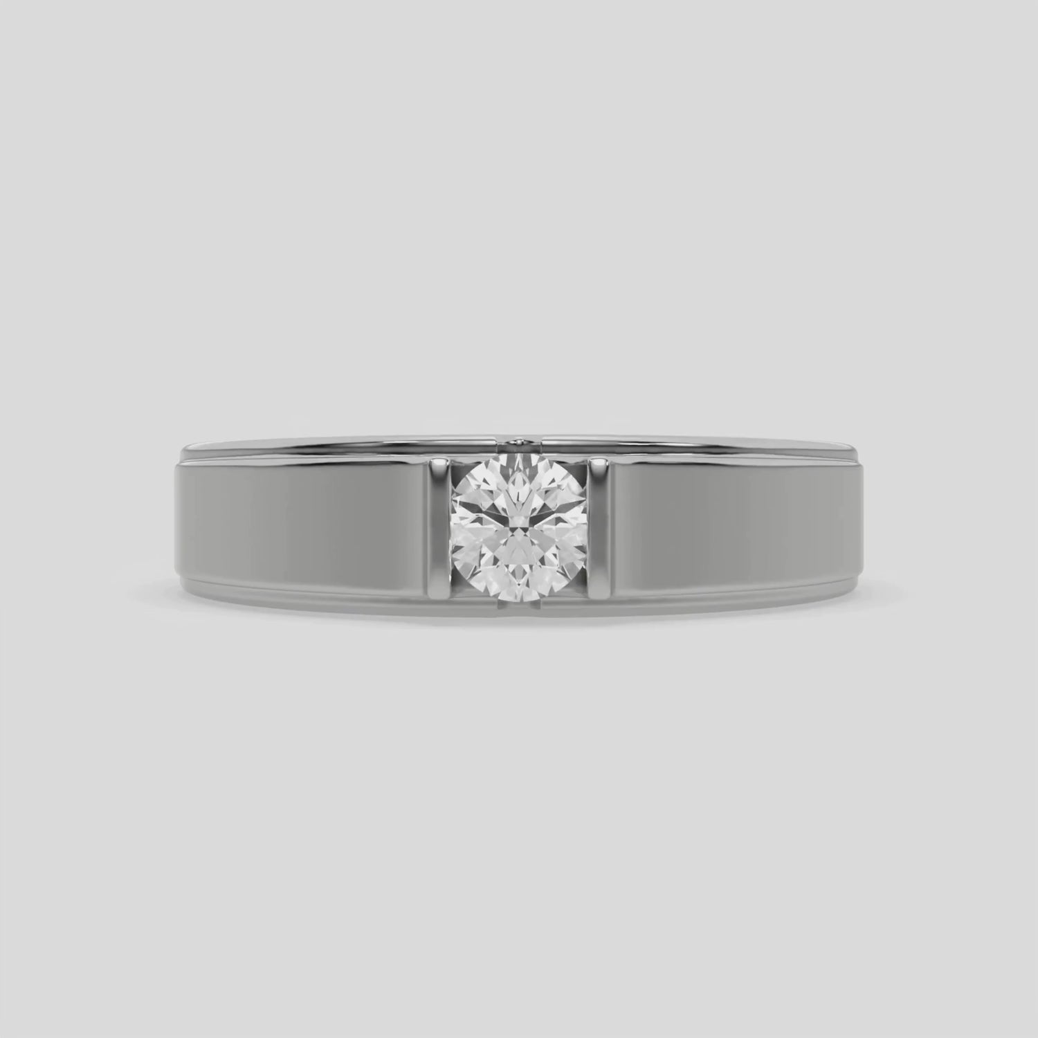 This video features a Tension set diamond solitaire ring, showcasing a solid gold band adorned with a stunning 0.50 Ct round brilliant-cut diamond at its center, elegantly secured in a tension setting