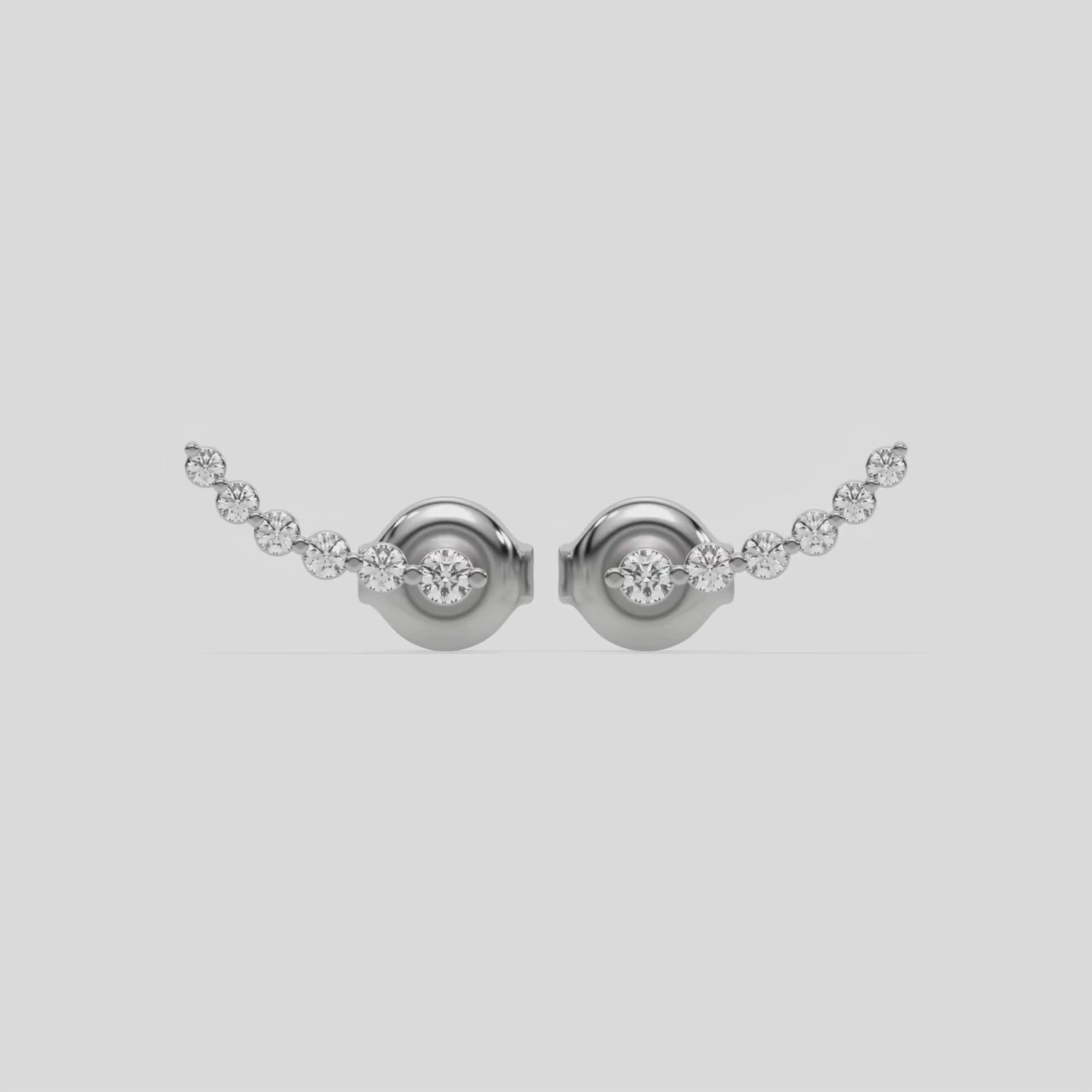 This video features a white gold Ear Climber Diamond Earrings made with round brilliant-cut diamonds in a prong setting