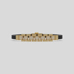 This video features a yellow gold Lex diamond rubber bracelet features 0.97 CT of round cut diamonds set in a pave setting 