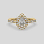 This video features a yellow gold Pear Diamond Halo Engagement Ring is made with a pear solitaire diamond set in a four-prong setting, surrounded by a halo of round diamonds all set on a pave band 