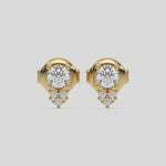 This video features a yellow gold Cluster Diamond Studs made with round brilliant-cut diamonds. The unique arrangement of diamonds forms a unique cluster design and all set in a prong setting