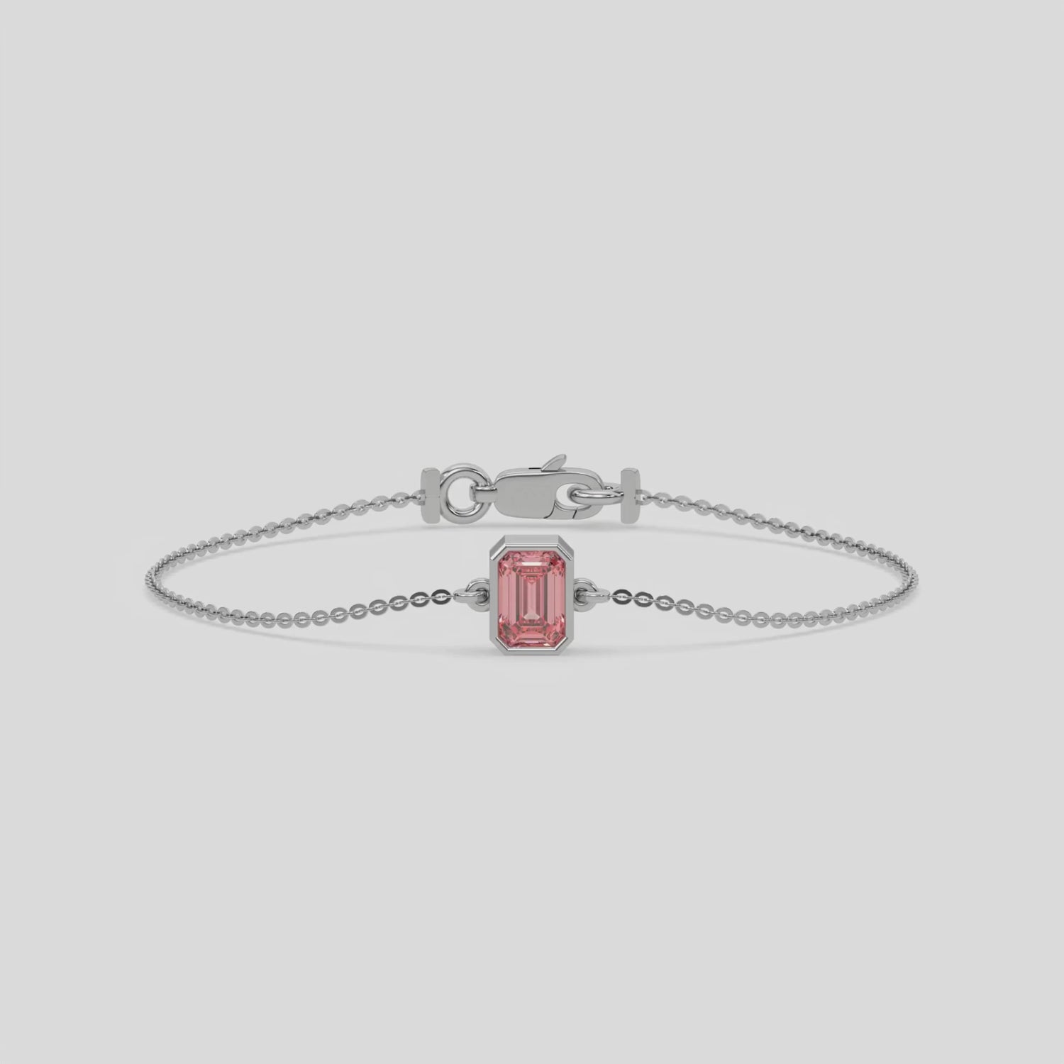 Fancy Pink Solitaire Emerald Diamond Bracelet made with fancy Pink emerald brilliant-cut diamond, securely set in bezel setting