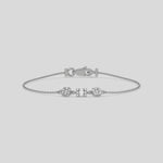 Baguette Diamond Cluster Bracelet made with baguette and round brilliant-cut diamond securely set in cluster and prong setting