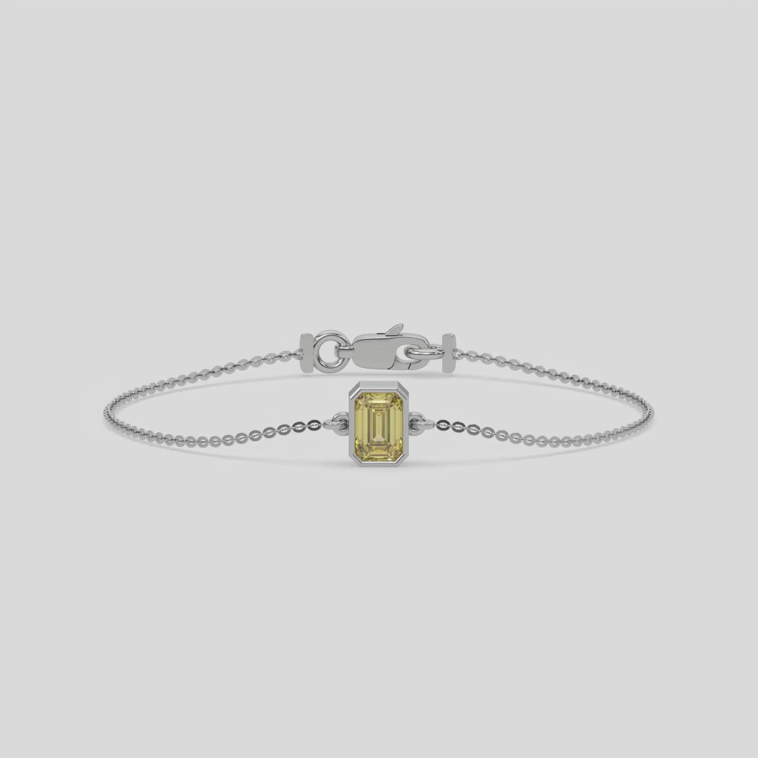 Fancy Yellow Solitaire Emerald Diamond Bracelet made with fancy yellow emerald brilliant-cut diamond, securely set in bezel setting