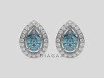 18k white gold Pear Diamond Halo Earrings made with a fancy Blue pear cut solitaire diamonds set in a four prong setting.