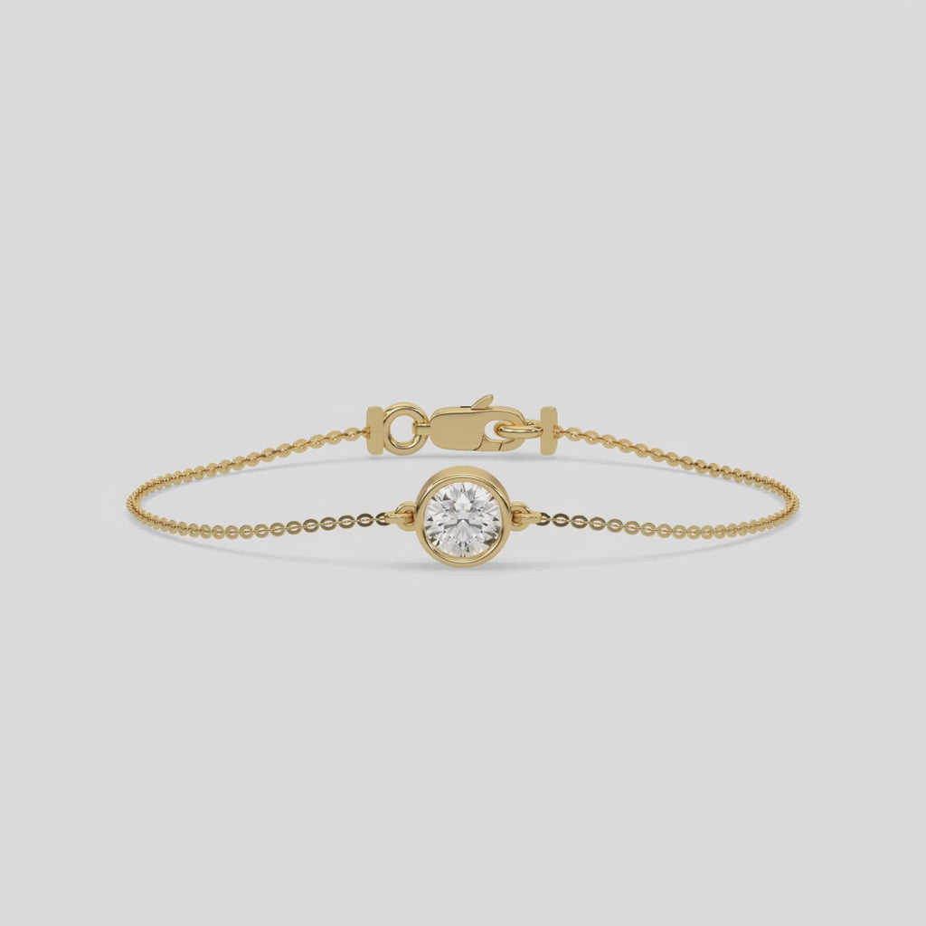 This video features a yellow gold Solitaire Round Diamond Bracelet made with round brilliant-cut diamond, securely set in bezel setting