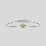 Fancy Yellow Solitaire Oval Diamond Bracelet made with fancy yellow oval diamond, securely set in prong setting