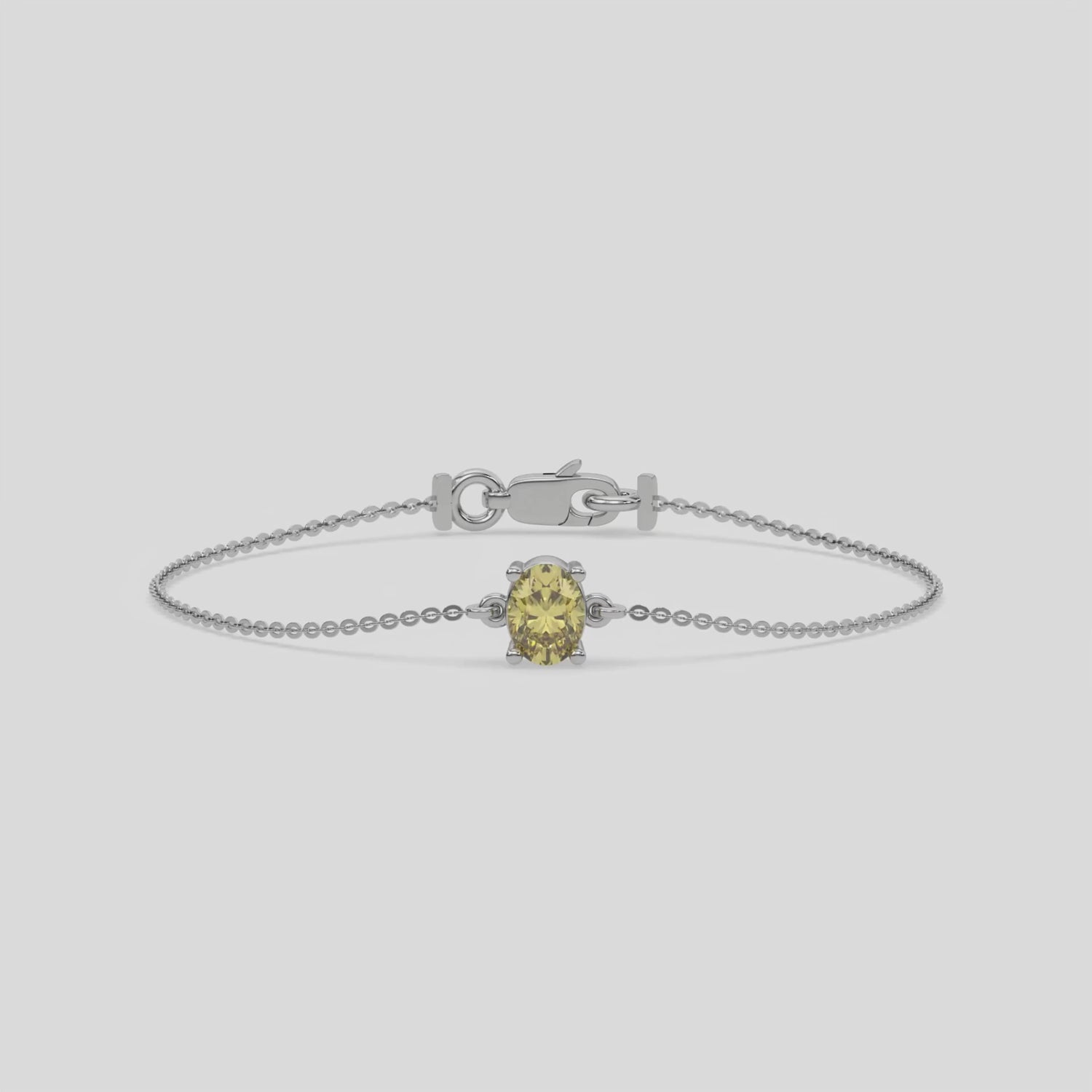 Fancy Yellow Solitaire Oval Diamond Bracelet made with fancy yellow oval diamond, securely set in prong setting