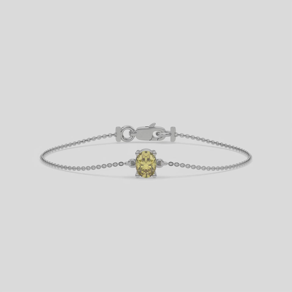 Fancy Yellow Solitaire Oval Diamond Bracelet made with fancy yellow oval diamond, securely set in prong setting