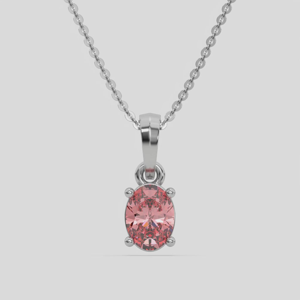 This white gold Fancy Pink Oval Solitaire Diamond Necklace made with an fancy Pink oval cut diamond in a four prong setting with adjustable chain 