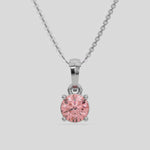  Fancy Pink Round Solitaire Diamond Necklace made with fancy Pink round brilliant-cut diamond in a four prong setting with adjustable chain 