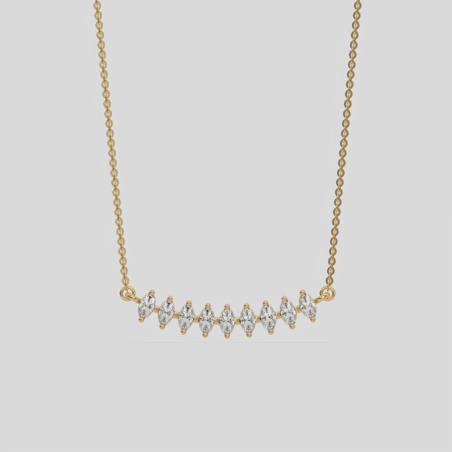 Curved Bar Diamond Necklace made with nine oval cut diamond set in a two prong setting