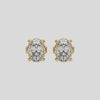 This video features a yellow gold Classic Oval Diamond Earrings made with an oval-cut diamonds set in a four prong setting