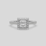 This video features a white gold ring is made with a princess solitaire diamond set in a four-prong setting