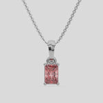  Fancy Pink Radiant Solitaire Diamond Necklace made with fancy radiant cut diamond in a four prong setting with adjustable chain