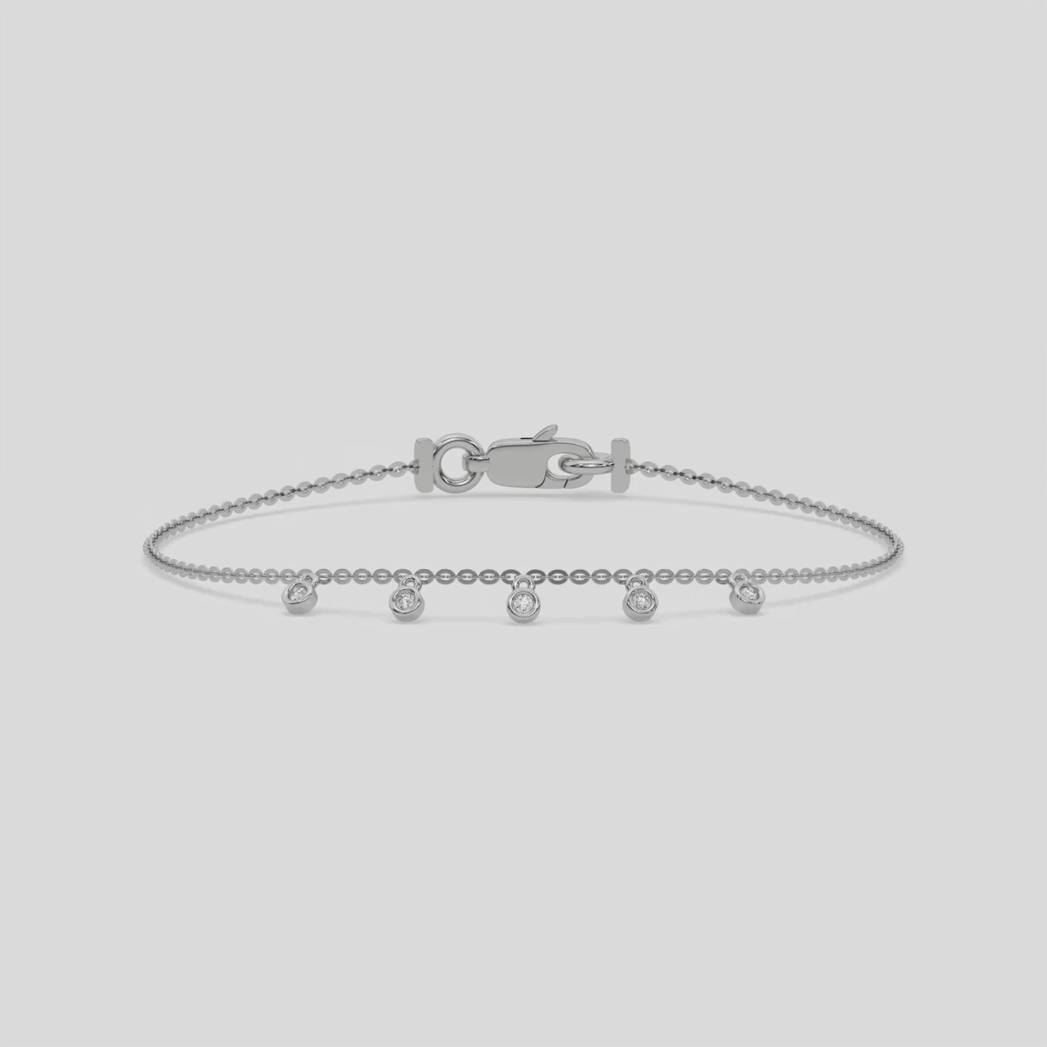 Dangling Round Diamond Bracelet made with five round brilliant-cut diamond securely set in bezel setting