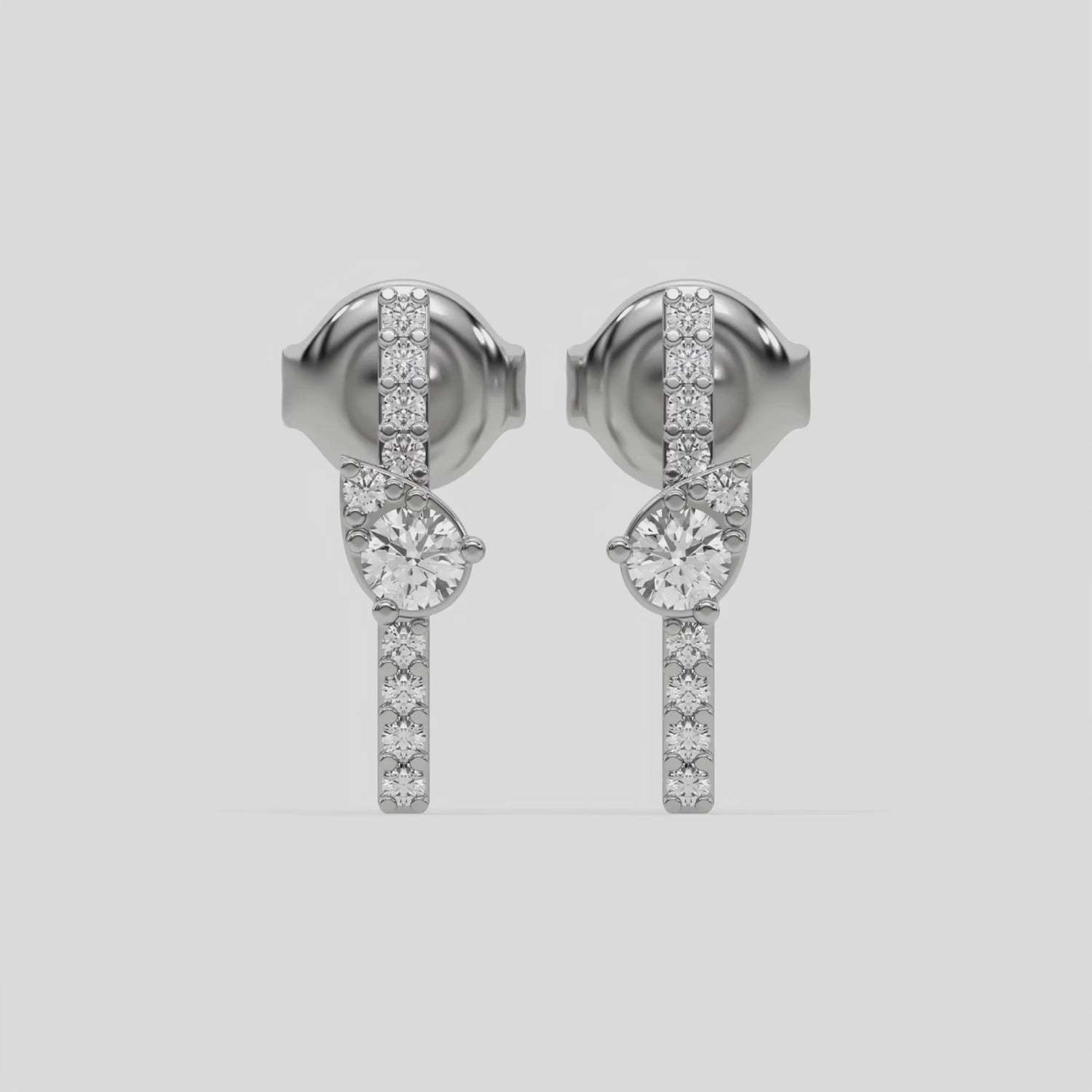 This video features a white gold Bar Diamond Earrings made with small round brilliant-cut diamonds in pave setting