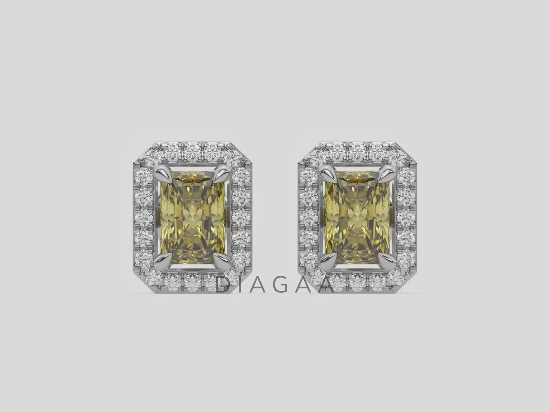 18k white gold Radiant Diamond Halo Earrings made with a fancy yellow radiant cut solitaire diamonds set in a four prong setting