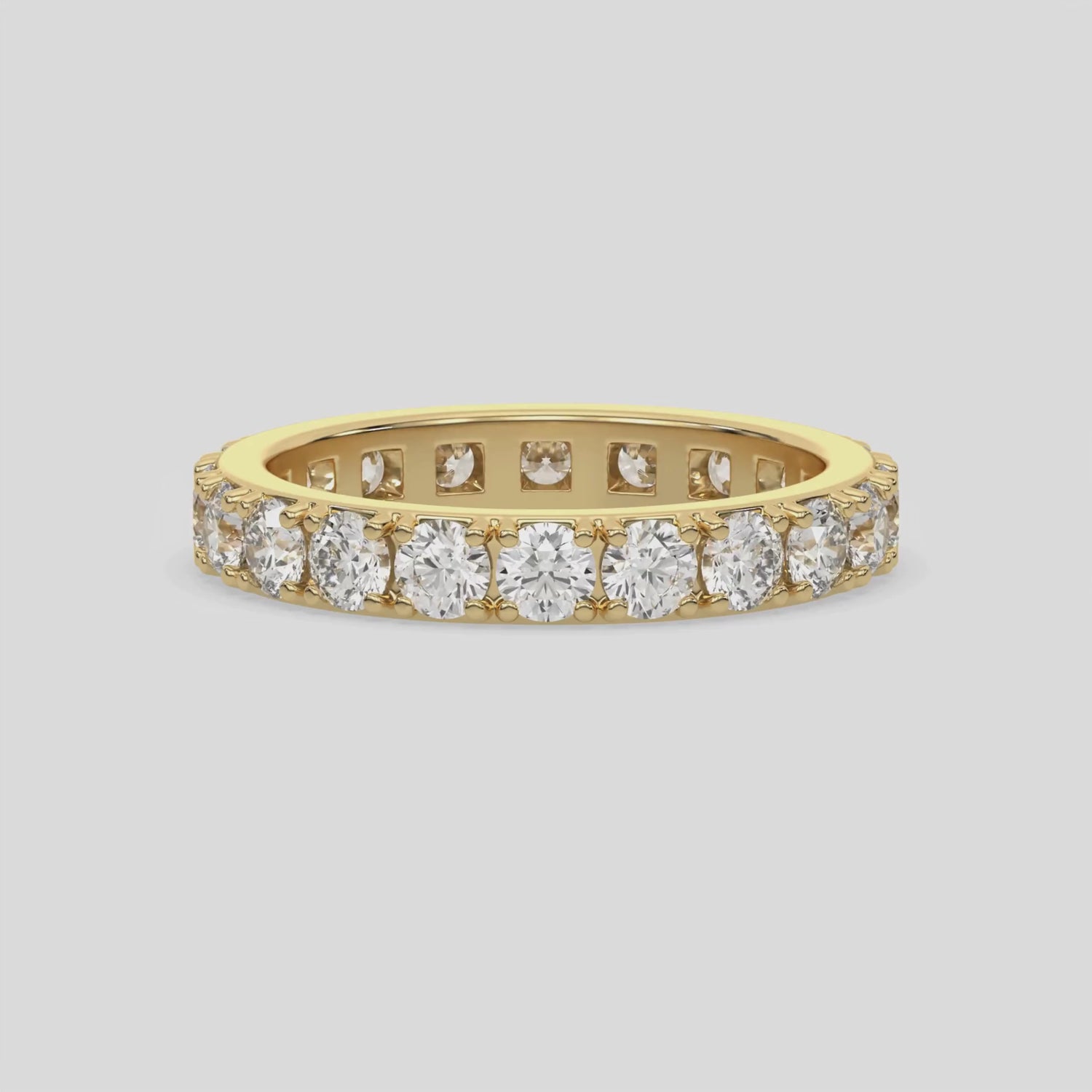 This video features a yellow gold Full Eternity Diamond Band made with brilliant cut round diamonds and set in a beautiful pave setting